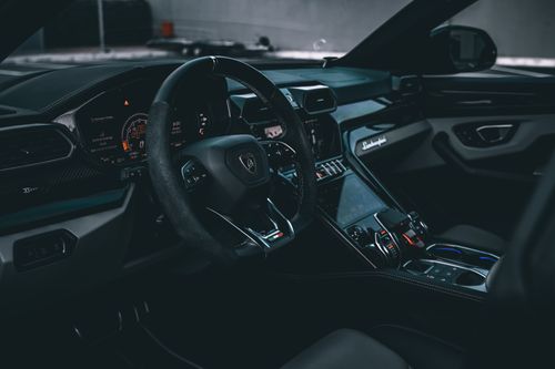 Free Close-up view of a luxury car interior showcasing modern technology and design. Stock Photo
