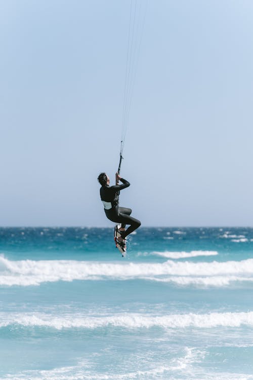 A person kite surfing on the ocean