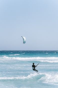 A thrilling kitesurfing moment captured on the waves of Esperance Beach in Western Australia.