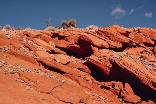 Free Explore the vibrant red rock formations captured under a bright blue desert sky, showcasing natural beauty. Stock Photo