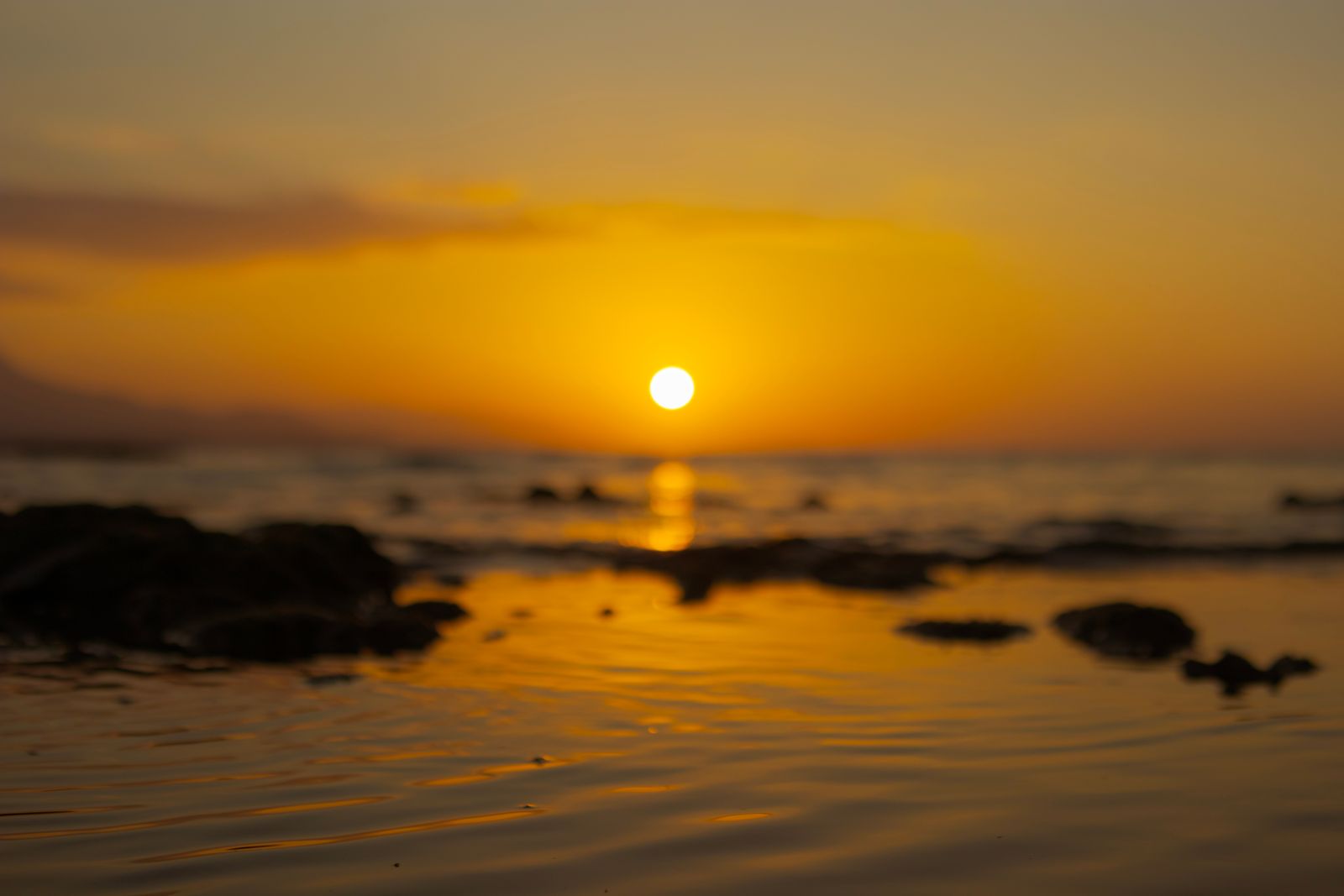 Low sun over the open sea — photo by Nothing Ahead on Pexels