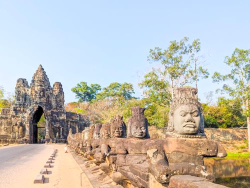 Free Explore the historic South Gate of Angkor Thom with its iconic stone figures in Cambodia. Stock Photo