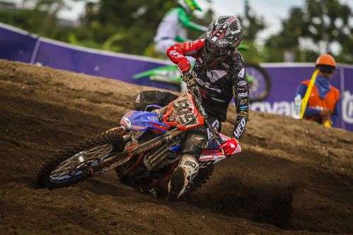 Free Intense motocross action on a dirt track in Lombok, showcasing skilled riders and thrilling competition. Stock Photo