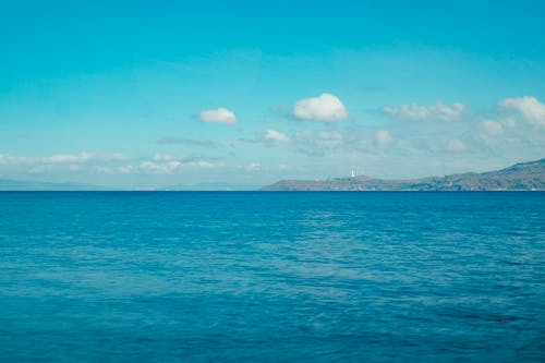 Foto profissional grátis de costa, grande-angular, mar