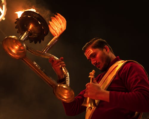 A man is holding a torch in his hand