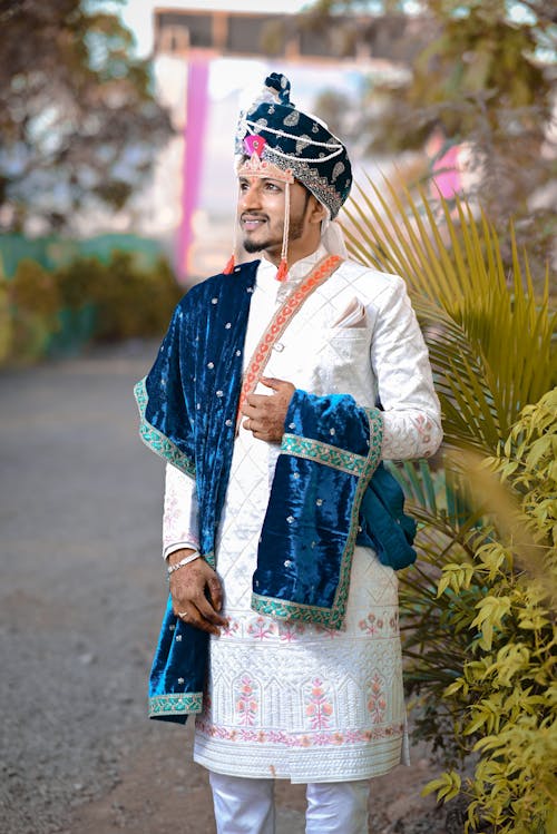 A man in a traditional indian outfit