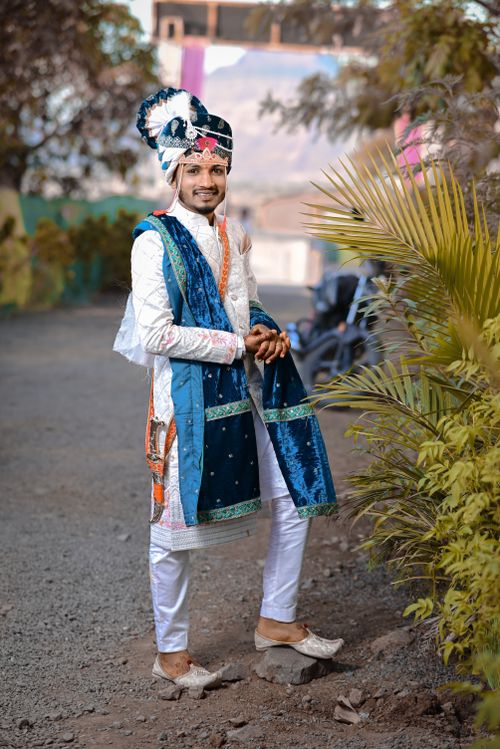 Free A smiling man in traditional Indian attire stands outdoors in Nashik, India. Stock Photo