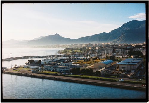 Free Stunning aerial view of Palermo's harbor and mountains in Sicily, Italy. Stock Photo
