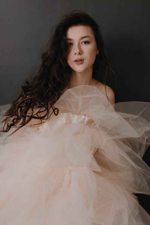 A woman in a pink tulle dress