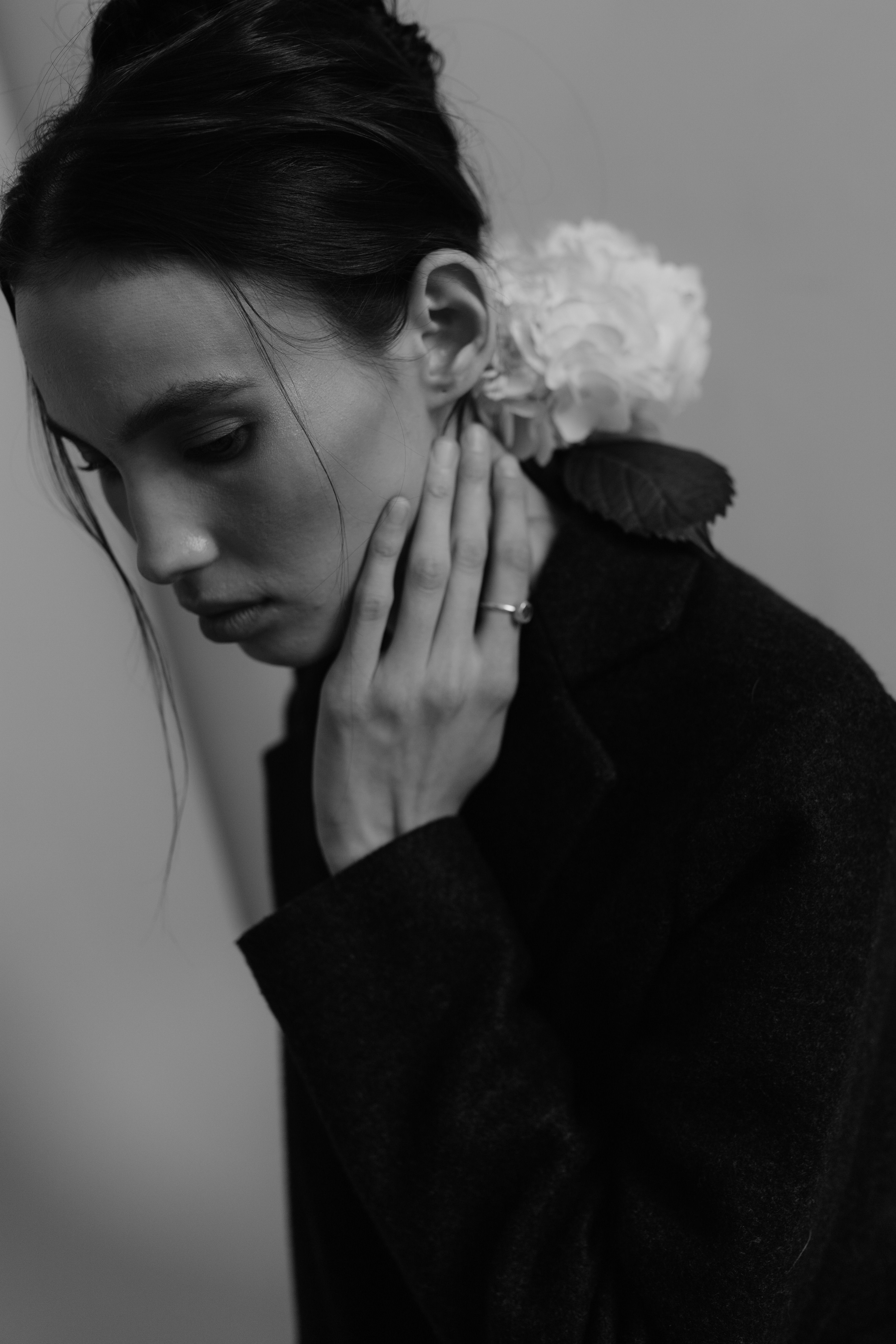 Black and White Portrait of a Woman with Flowers · Free Stock Photo