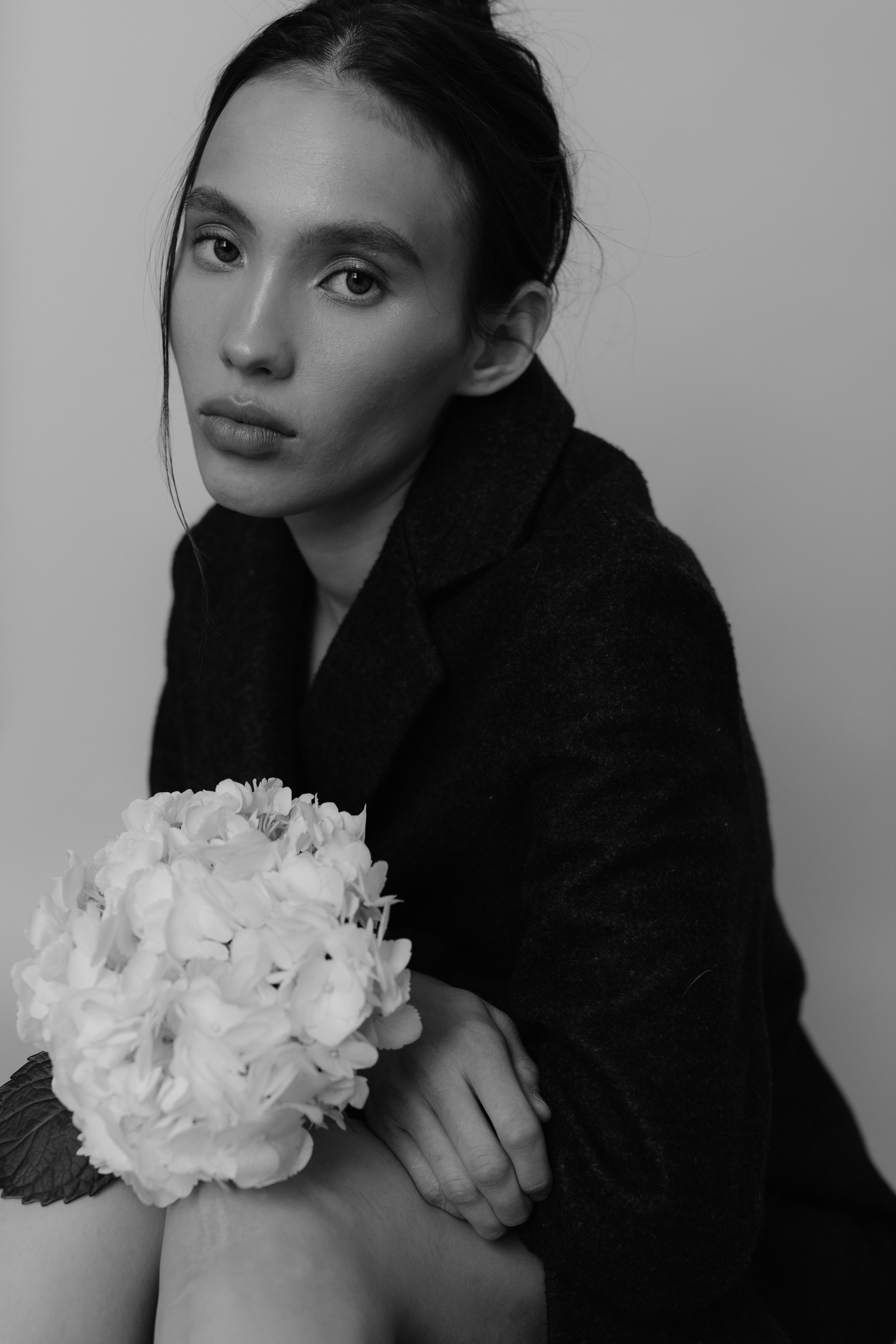 Woman with Flowers in Black and White · Free Stock Photo
