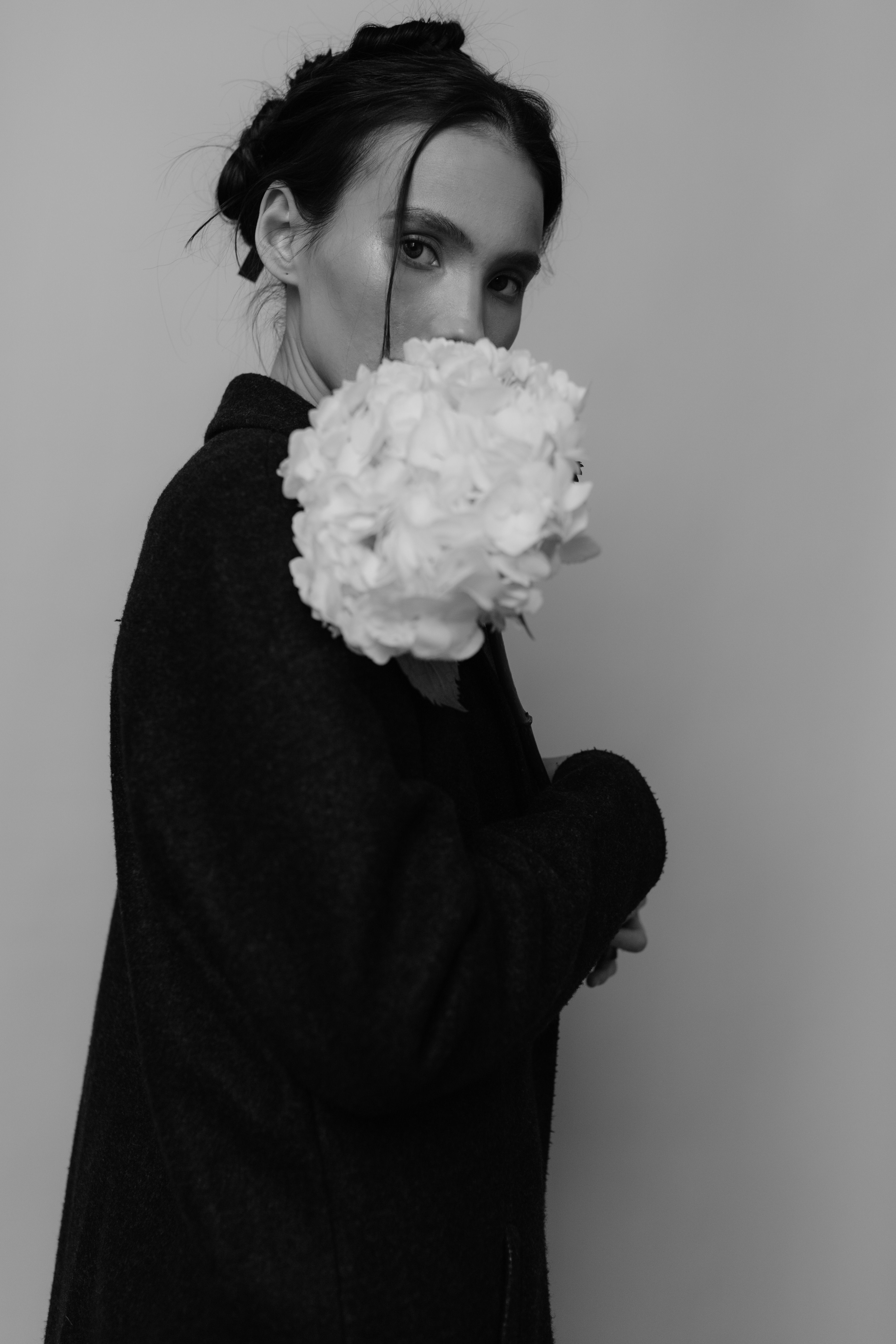 Portrait of Woman with Flowers in Black and White · Free Stock Photo