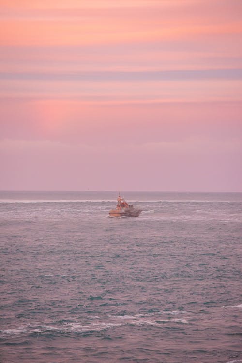 Motorboat on Sea at Dusk