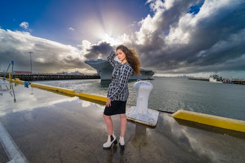 Young Woman Standing Dock Stormy Day