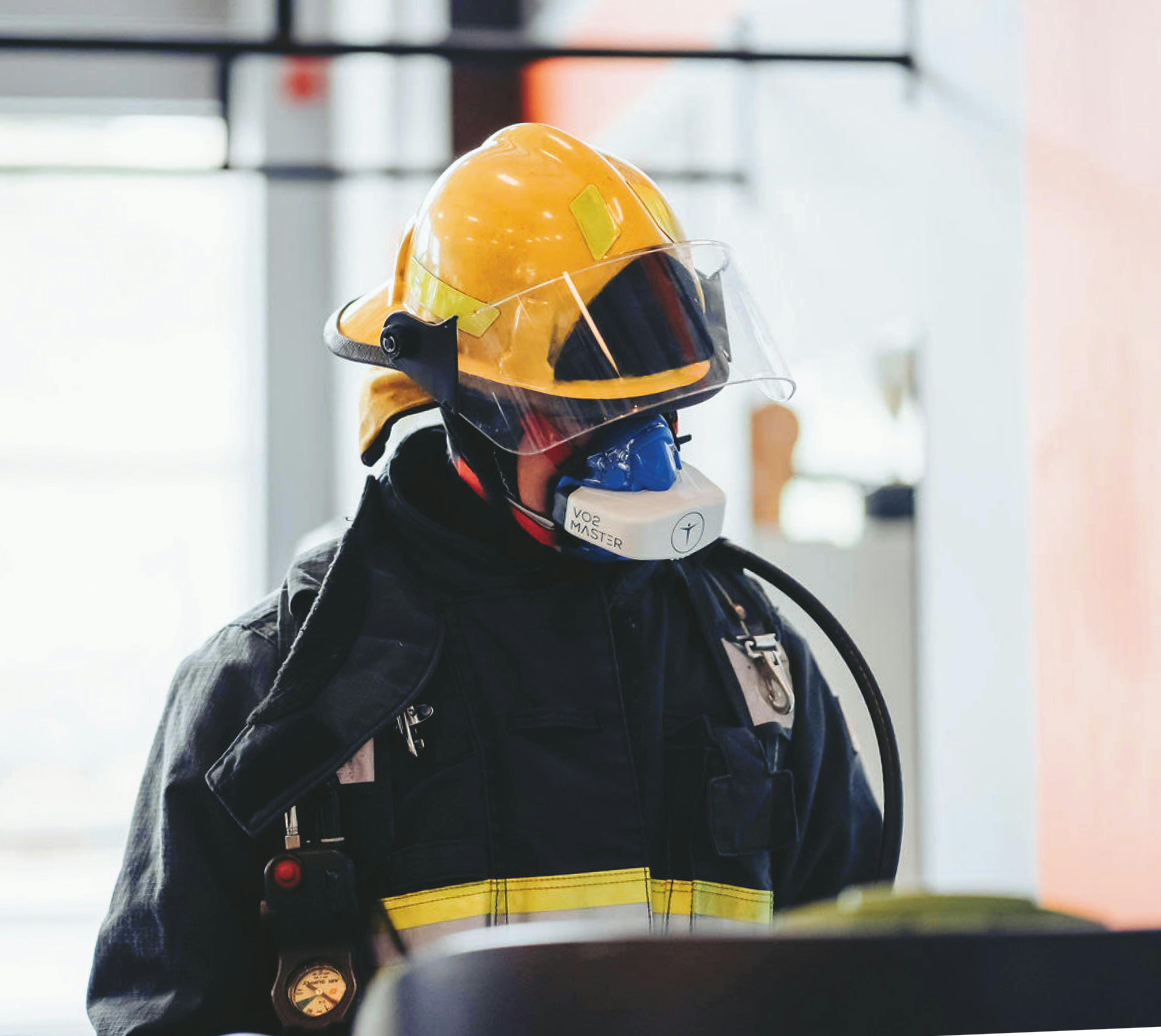 firefighter in helmet and mask