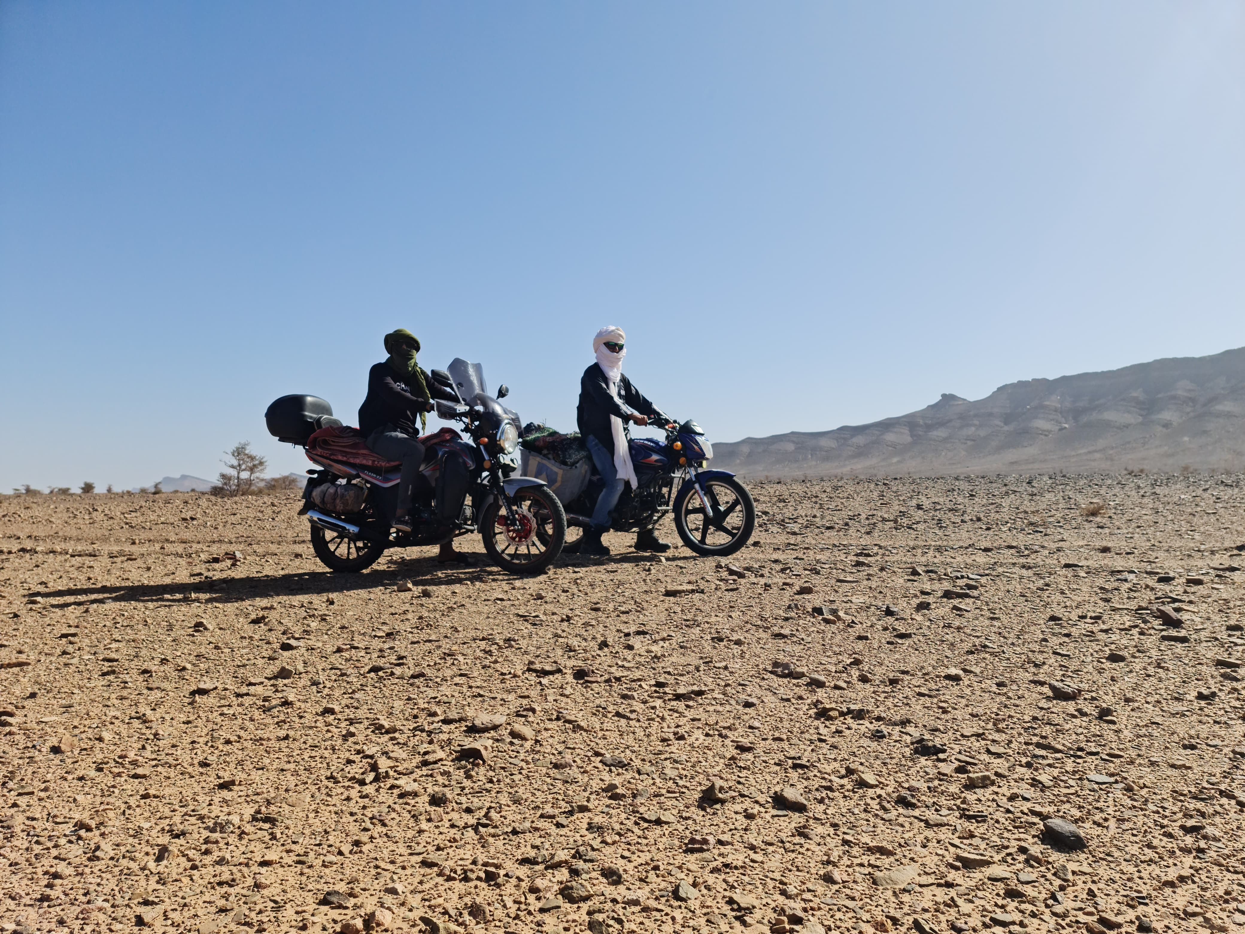 Men Riding Motorcycles in a Desert · Free Stock Photo