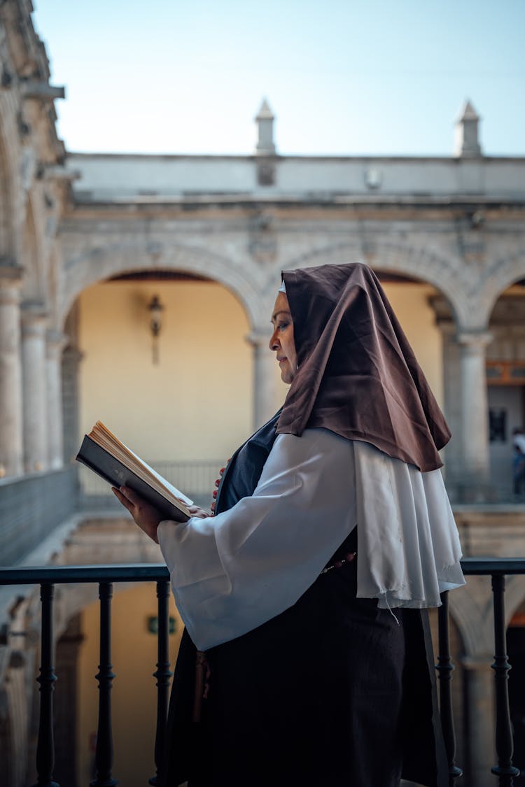 Nun With Book