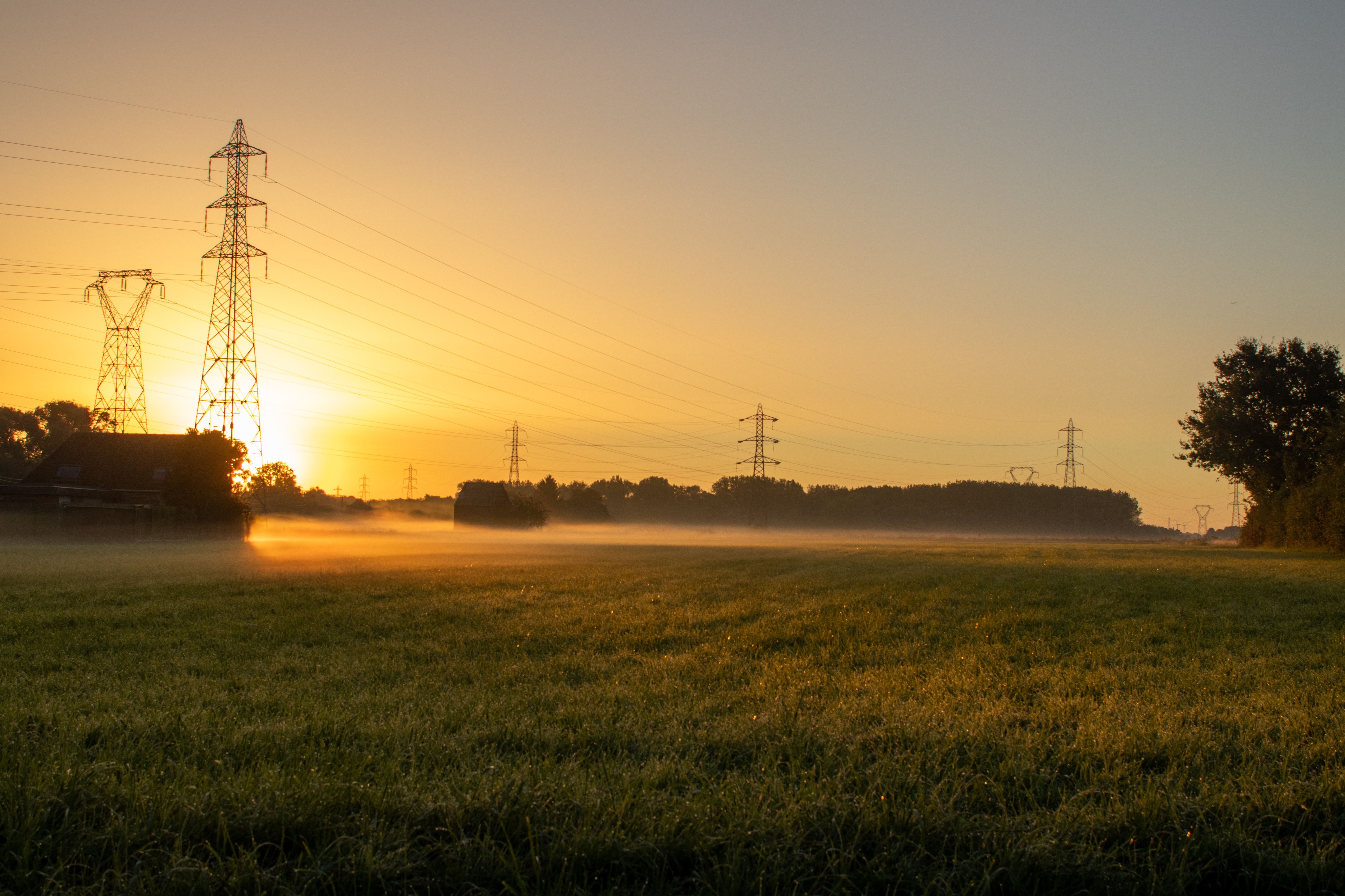 Power transmission towers sunset — Dicas de Ações