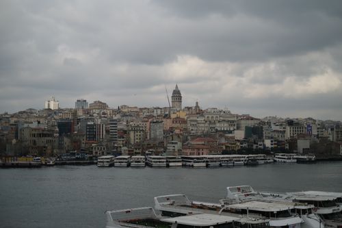 Free Overcast day showing the historic Galata Tower among Istanbul's cityscape by the Bosphorus Strait. Stock Photo