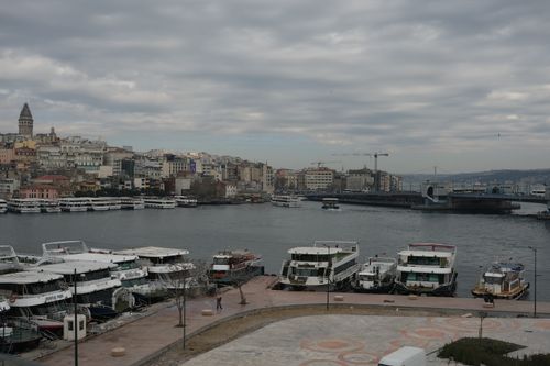 Free Overcast day at Istanbul's waterfront featuring boats and iconic city view. Stock Photo