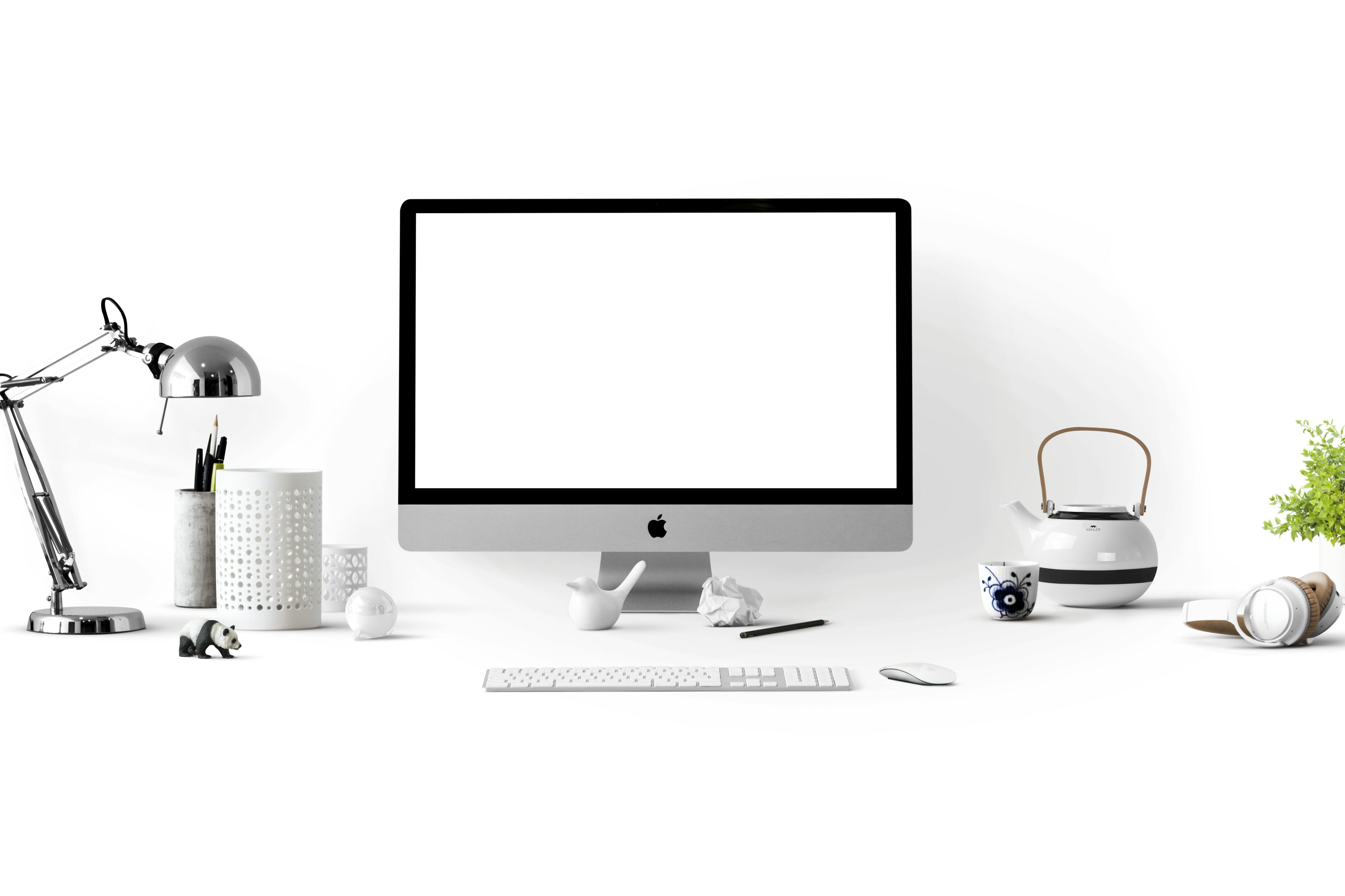 silver imac near white ceramic kettle