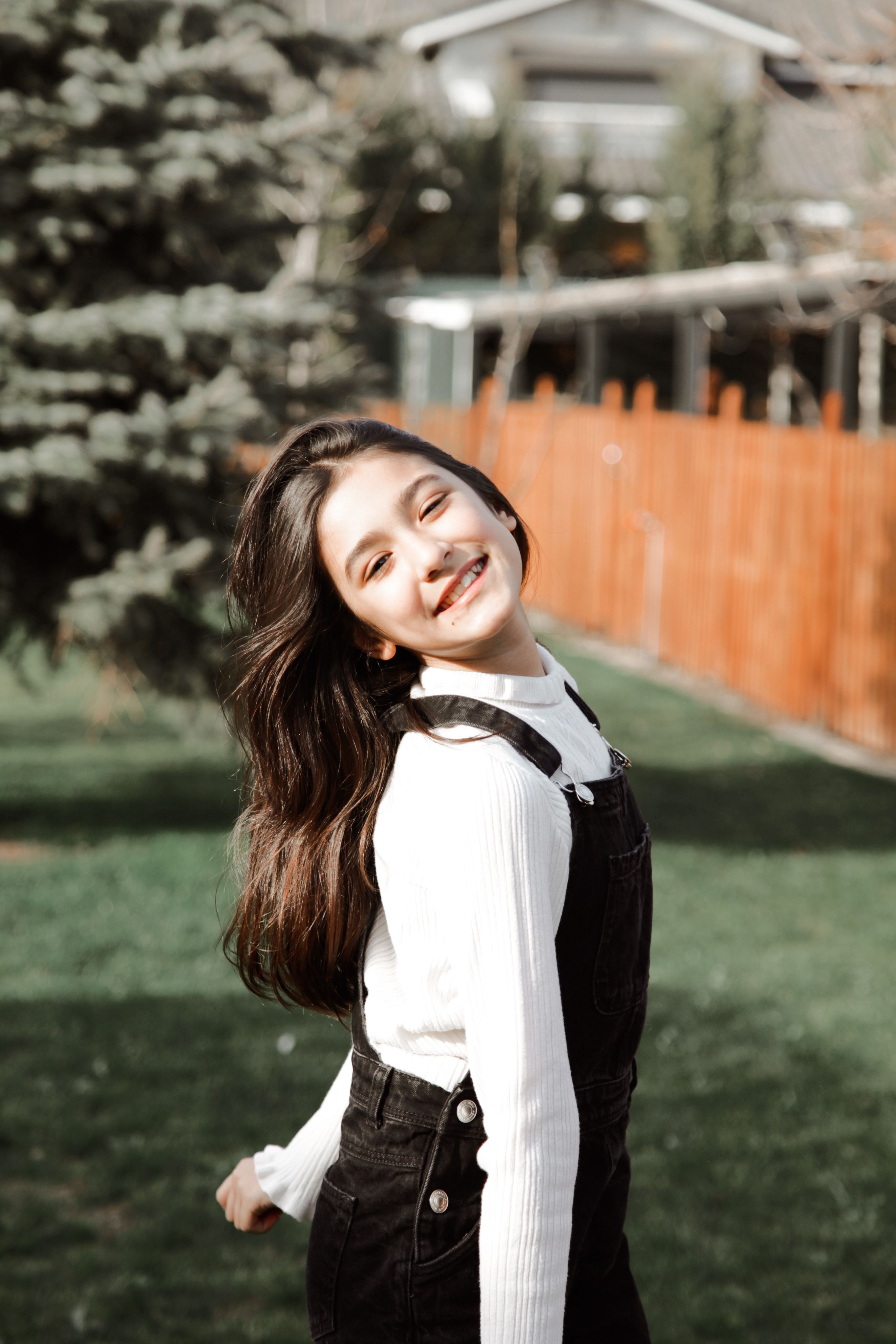 Portrait of Smiling Girl with Long Hair · Free Stock Photo