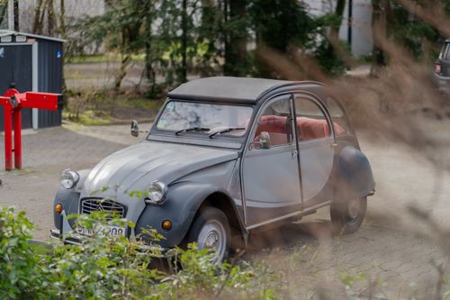 Free Classic Citroen 2CV car parked with selective focus on a sunny day. Stock Photo