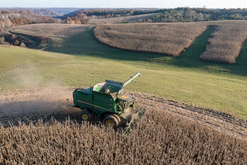 Foto profissional grátis de agricultura, área, colheitadeira