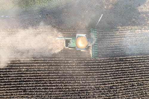 Aerial view of a combine harvester in the field
