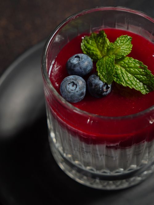 Free Delicious dessert with blueberries and mint leaves in a glass jar, perfect for sweet indulgence. Stock Photo