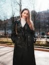 Woman Wearing Leather Coat on a Street