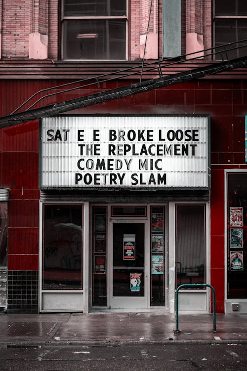 A sign that says say e a bloeke the replacement for poetry slam