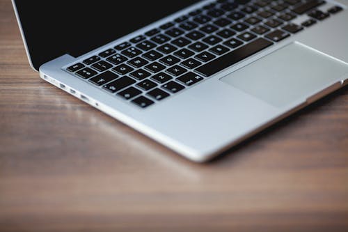 Free Silver and Black Laptop Computer Turned Off Stock Photo