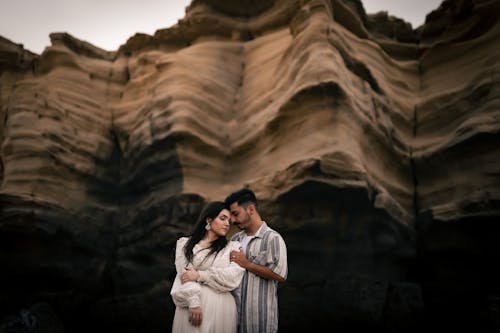 Woman in White Dress and Man in Shirt