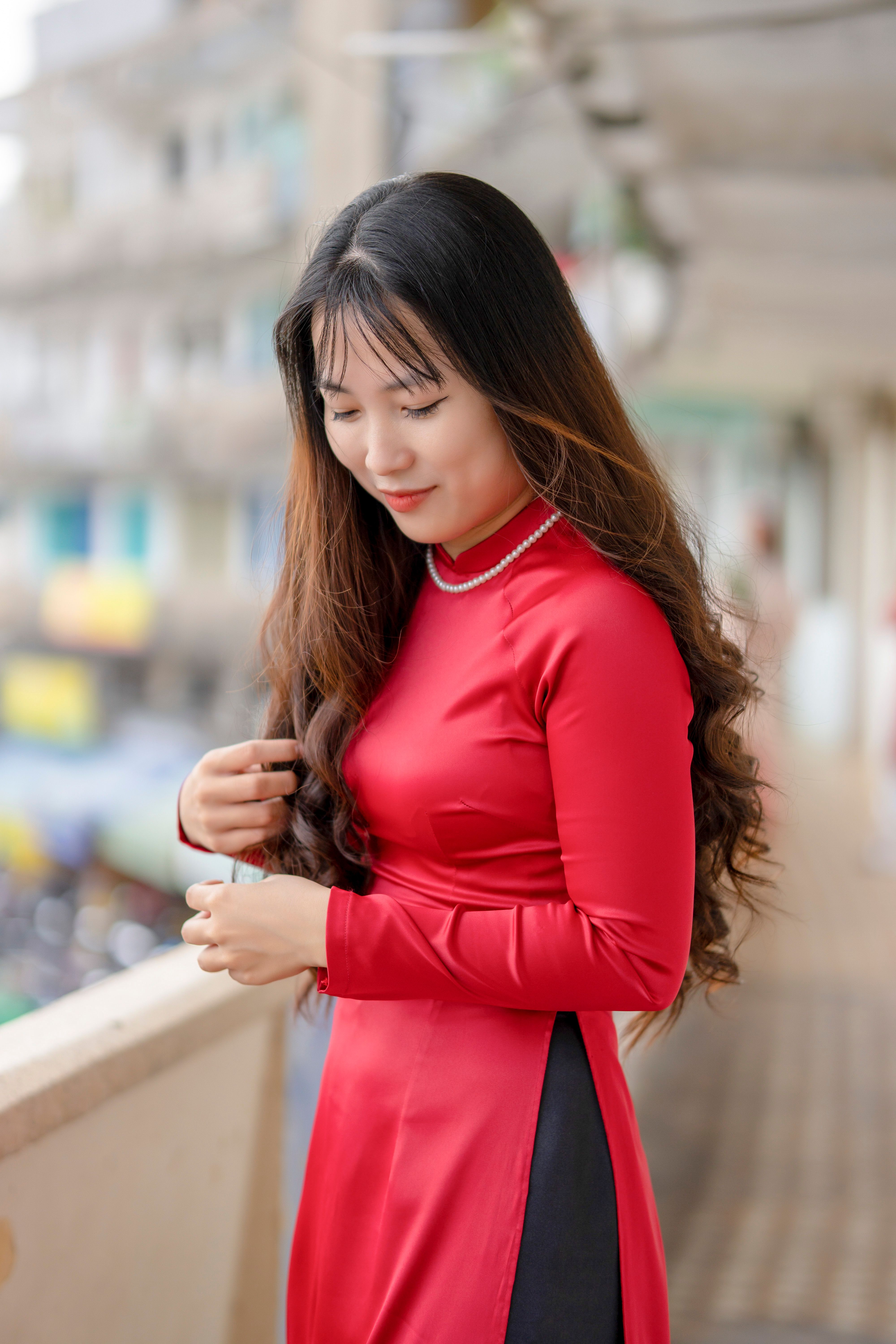 Portrait of Woman Wearing Traditional Red Gown · Free Stock Photo