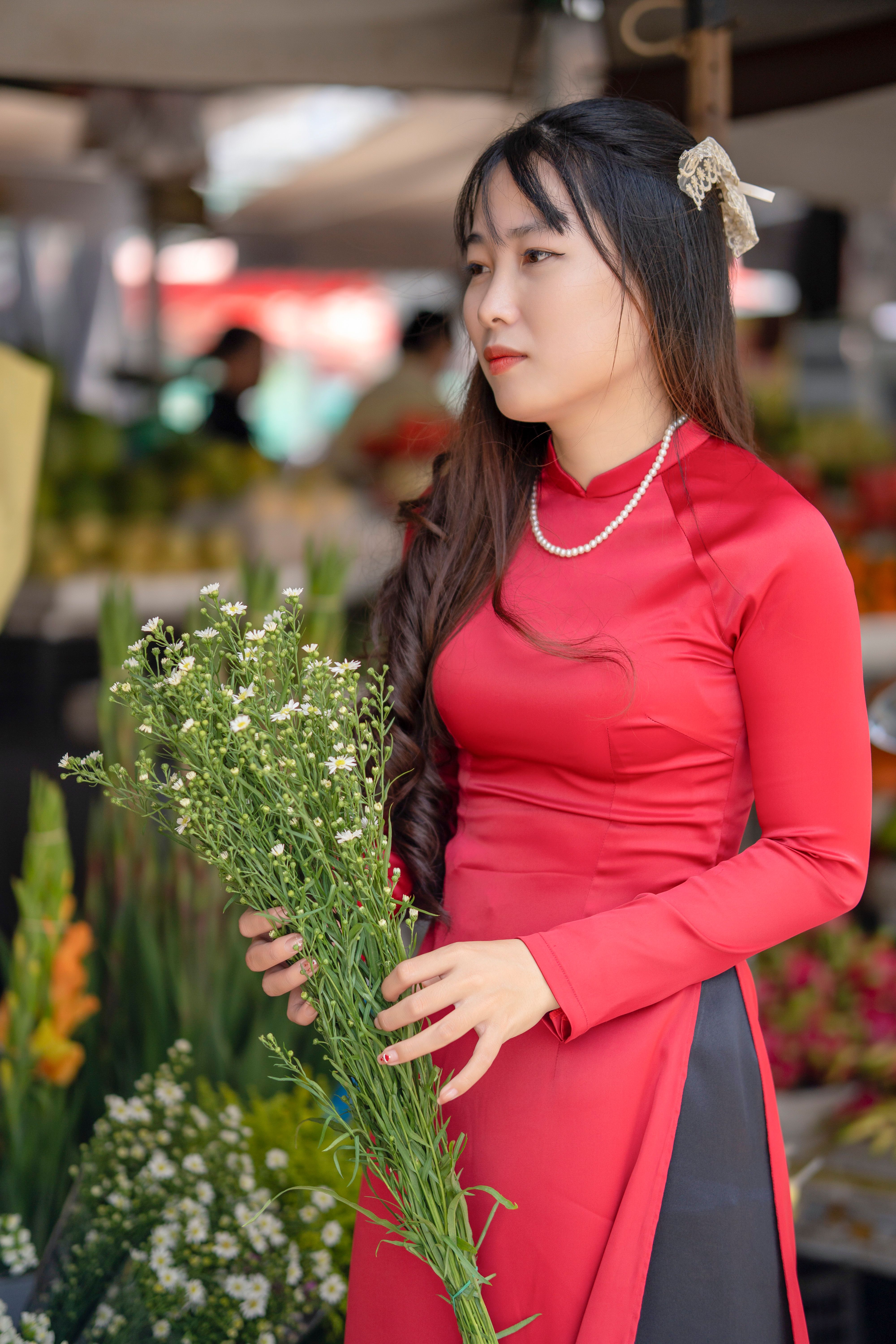 Portrait of Woman Wearing Traditional Red Gown · Free Stock Photo