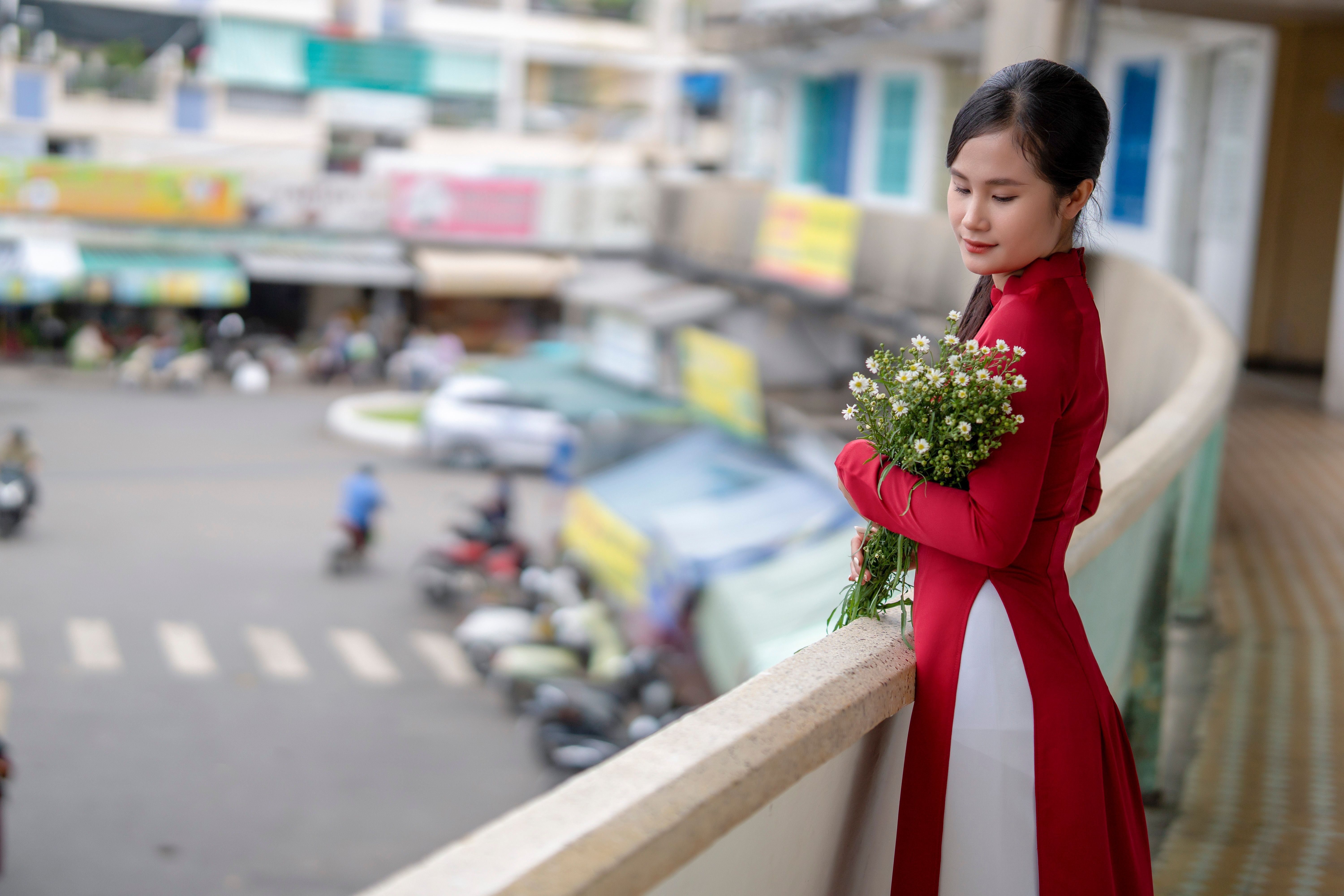 Portrait of Woman Wearing Traditional Red Gown · Free Stock Photo