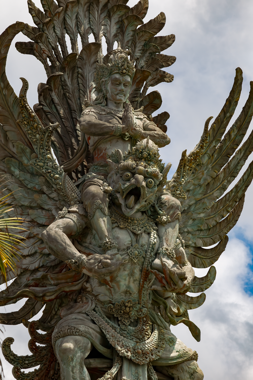 Free Intricate sculpture of Vishnu and Garuda at Garuda Wisnu Kencana Park in Bali, Indonesia. Stock Photo