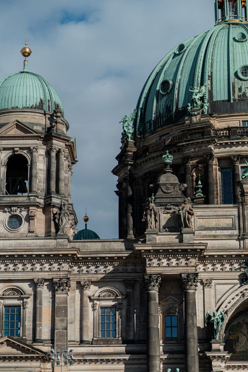 Free Detailed view of a historic cathedral's domes and intricate architecture under a clear sky. Stock Photo