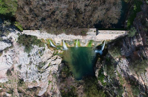 Foto profissional grátis de água corrente, árvores, barragem