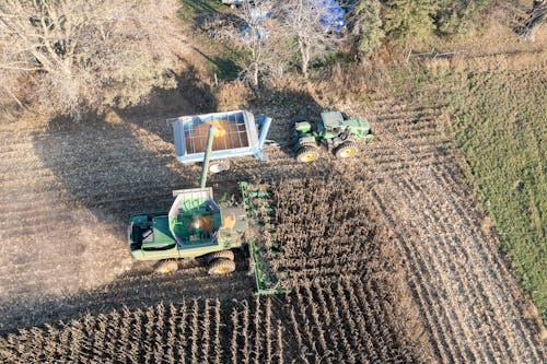Aerial view of a combine harvesting a field