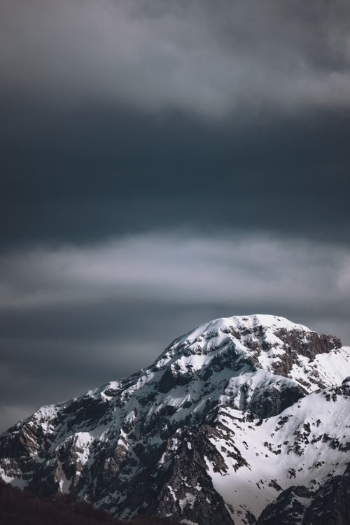 Storm Clouds over a Mountain Range · Free Stock Photo