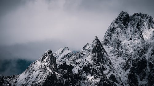 A mountain range with snow on top