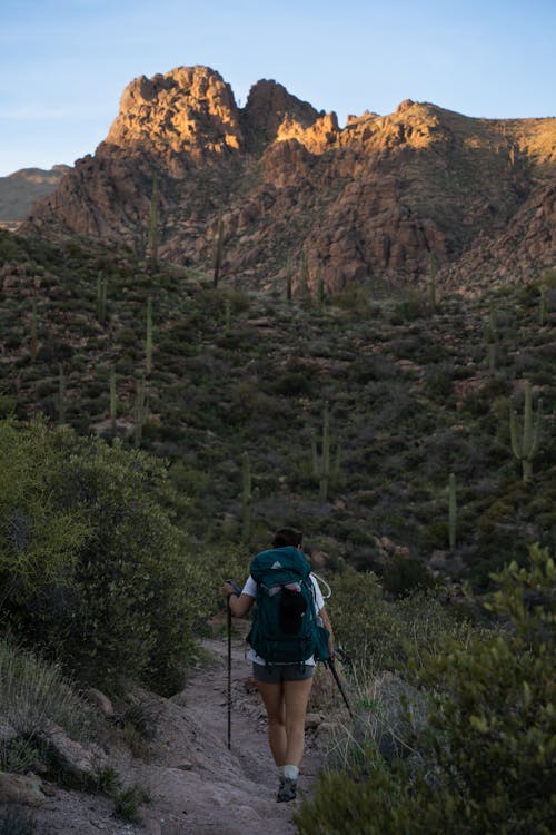 Woman Hiking with Backpack on Footpath in Arizona