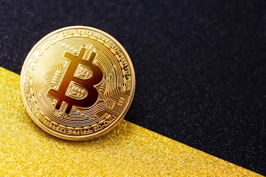 Close-up of a golden Bitcoin on a contrasting black and gold background, symbolizing digital currency and finance.