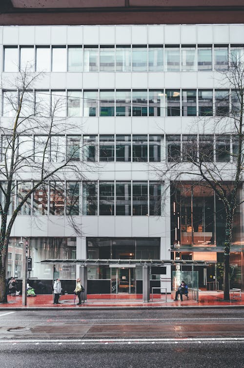 A city street with a building in the background