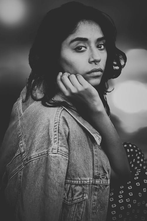 Grayscale Photography of Woman Wearing Denim Jacket