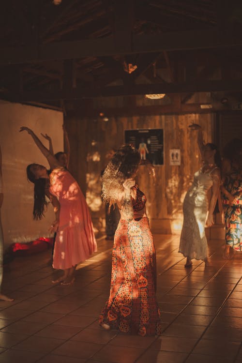 A group of women dancing in a room