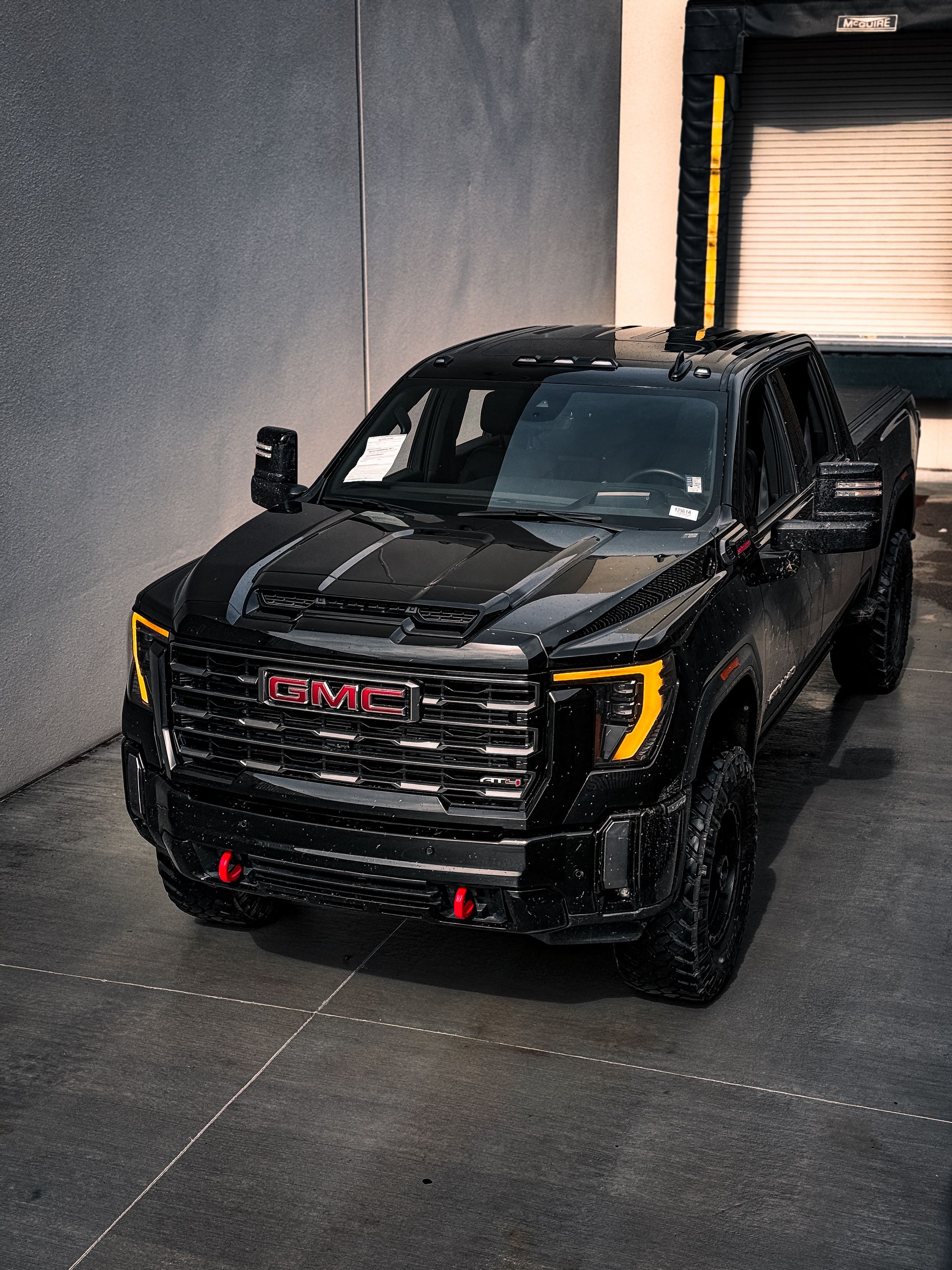 Blacked-out premium pickup truck with a deep gloss exterior finish