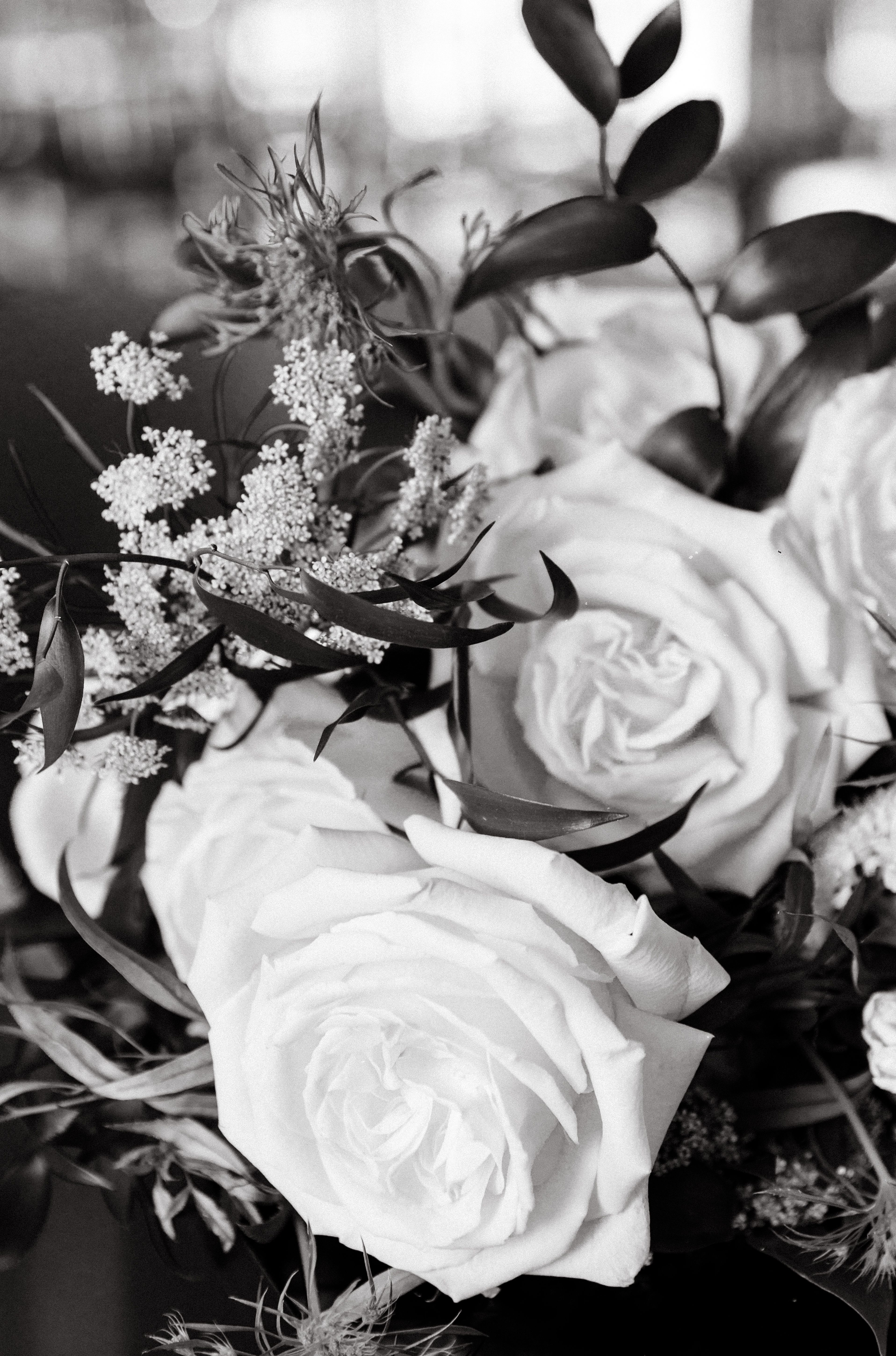 Black and White Photograph of a Bouquet with Roses · Free Stock Photo